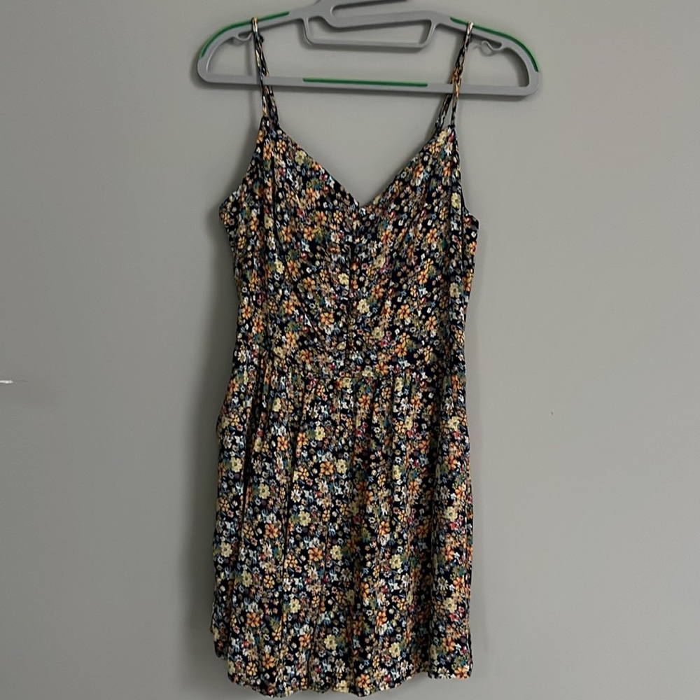 Floral romper WITH pockets!